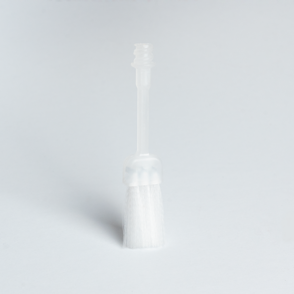 Bosko replacement PVC glue brush standing upright showing full brush stem and bristle head, side view
