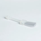 Bosko replacement PVC glue brush angled view showing flat bristle head and clear handle stem close-up
