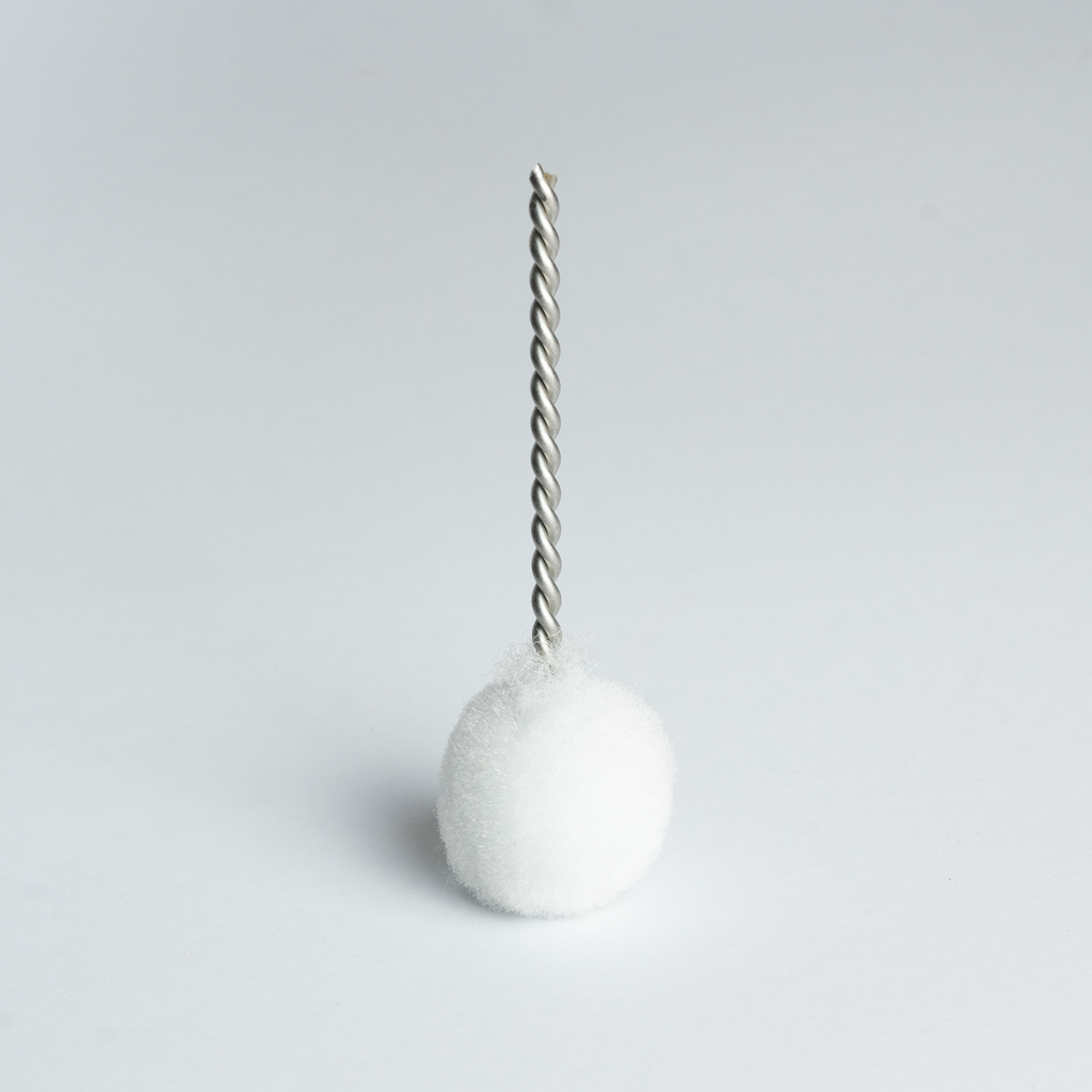 Bosko replacement primer brush standing upright showing round white bristle head and full twisted wire stem
