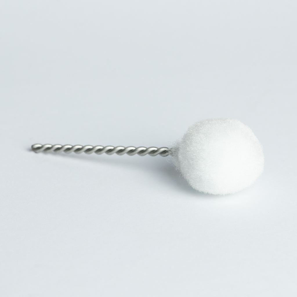 Bosko replacement primer brush close-up showing round white bristle head and twisted wire stem on light background
